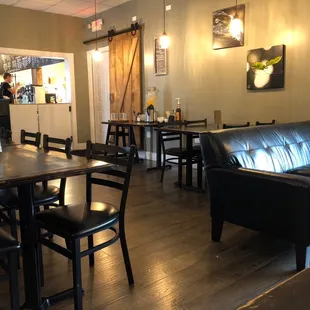 The decor is really nice. I like the sliding barn door to hide the exit door.  Look at the size of the chicken sandwich!