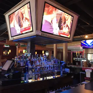 Great place to catch a game! Social oriented four sided bar