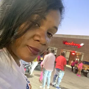 a woman in a parking lot