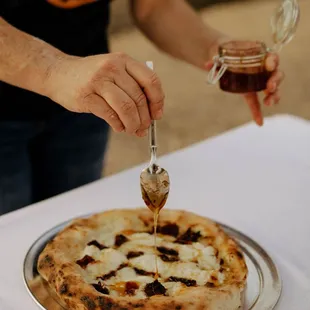 a person holding a spoon