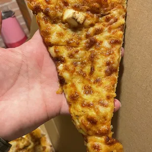 Slice of shahi paneer pizza