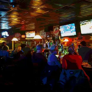 people sitting at the bar