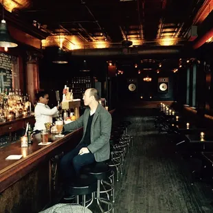 a man sitting at a bar