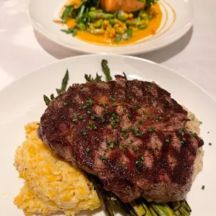 a steak and asparagus on a plate