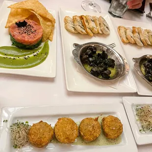 a variety of appetizers on plates