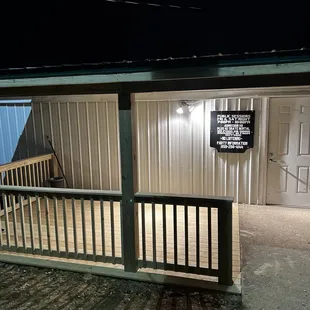 Picture of the front door and covered smoking area!