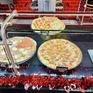 Pizzas at the next door store Sbarro