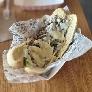 PHILLY CHEESESTEAK: steak, peppers, mushrooms, onions &amp; provolone cheese on a toasted roll (NO lettuce, tomato, mayo &amp; pickle) | $14.69 (L)