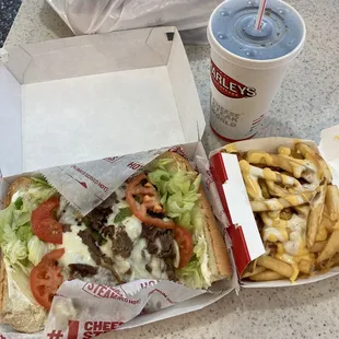 Large Philly Cheesesteak, ultimate fries, and a regular coke combo, $16.66, tax included