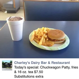 a plate of fries and a drink
