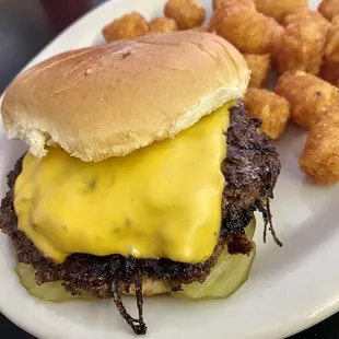 Original Charley Burger - grilled thin &amp; crisp, caramelized onions grilled in the patty, mustard &amp; dill pickles w/ tots