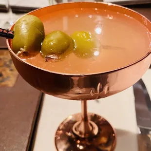 Blue cheese and bacon stuffed olives dirty martini