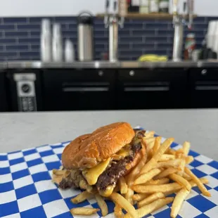 a cheeseburger and fries