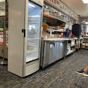 a woman sitting in a chair in a restaurant