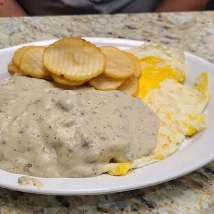 Eggs, home fries and a 1/2 order of biscuits and gravy.