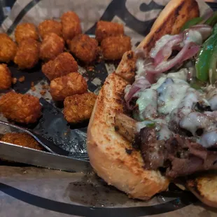 Philly cheese steak &amp; tatertots. Meat/veggies were grilled perfectly, highly recommend