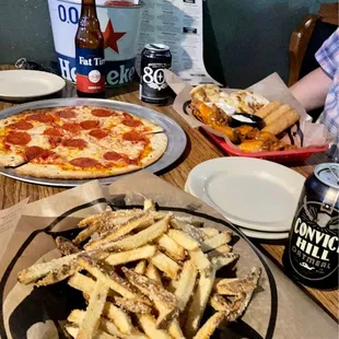 a pizza and french fries