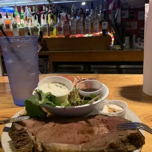 Prime Rib with a side salad-perfectly cooked medium rare-tender with a large eye and very little fat.