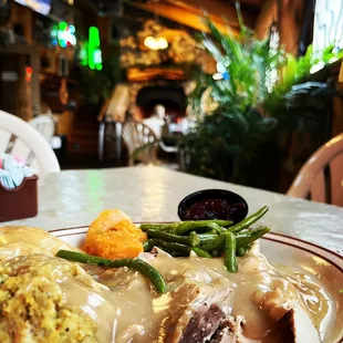 The roaring fire in the covered patio dining area.