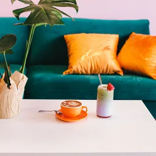 a coffee table with a cup of coffee on it