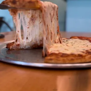 a slice of pizza on a plate