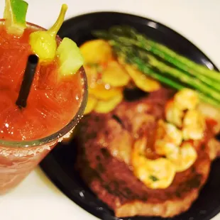 Rib Eye steak and chimp with Charlie L&apos;s Bloody Mary