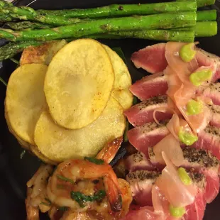 Ahi tuna over Thai red curry wasabi sauce with sautéed shrimp