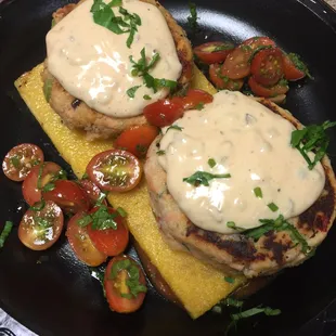 Vegan-seared polenta over potato pancake and grape tomatoes