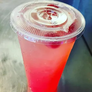 a drink in a plastic cup