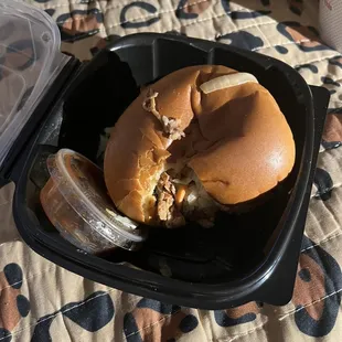 Throwing away 3/4 of a bland $13 pulled pork sandwich. Because it was tasteless and dry