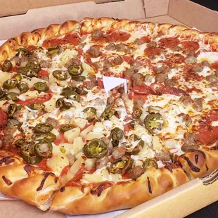 DONT ASK FOR EXTRA CHEESE! THEY ADD ENOUGH! Half Pepperoni, sausage and Pineapple and half Pineapple,Jalapeño and Pepperoni