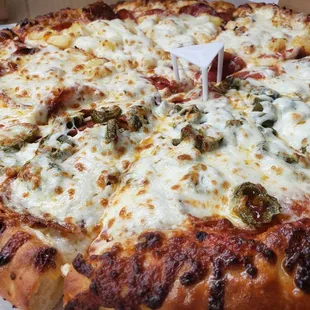 DONT ASK FOR EXTRA CHEESE! YHE ADD ENOUGH! Half Pepperoni, sausage and Pineapple and half Pineapple,Jalapeño and Pepperoni