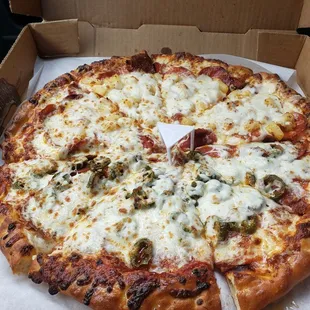 DONT ASK FOR EXTRA CHEESE! THEY ADD ENOUGH! Half Pepperoni, sausage and Pineapple and half Pineapple,Jalapeño and Pepperoni