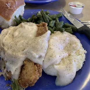 Chicken Fried Steak, Mashed Potatos, White Gravy, Green Beans with a Roll