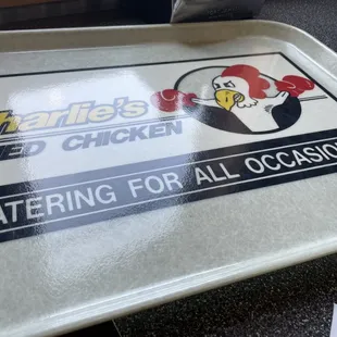 a tray with a sign on it