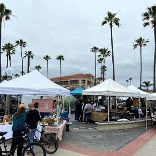 a crowd of people at a market