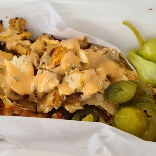 The chicken was also good with the sauce, and pairs well with the pickled jalapeños.