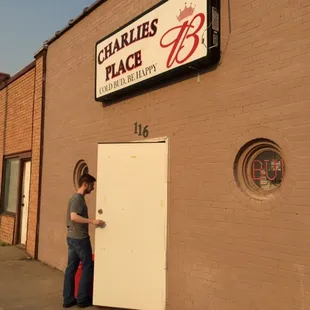 a man standing in front of a door