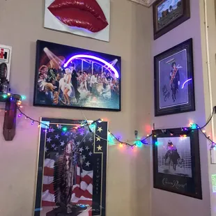 a room with pictures and lights