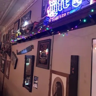 the neon sign above the bar