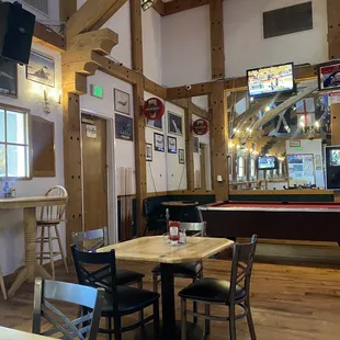 Pool table &amp; jukebox available next to the bar