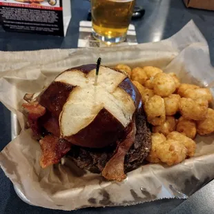 They offer an amazing pretzel bun for their burgers! Don't forget the tots!