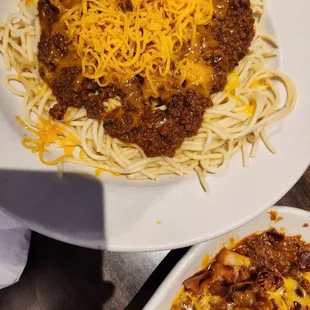 Charlie's special, chili and cheese over spaghetti