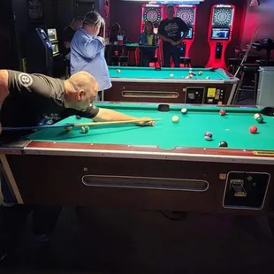 a man playing pool