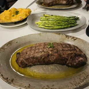 14 oz strip steak, potatoes Au gratin, asparagus