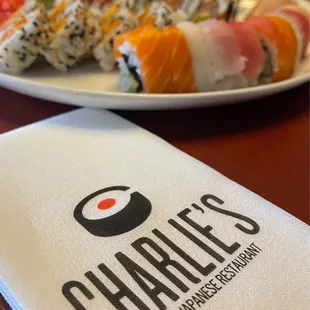 a plate of sushi rolls