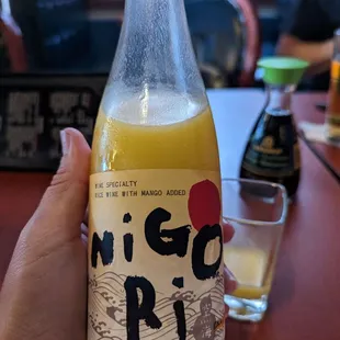 Cold mango sake. Very sippable.