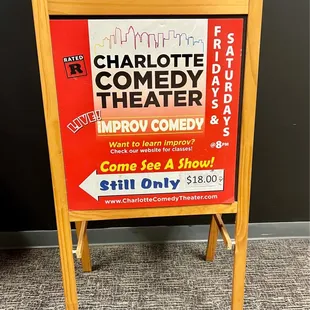 a sign for charlotte comedy theater