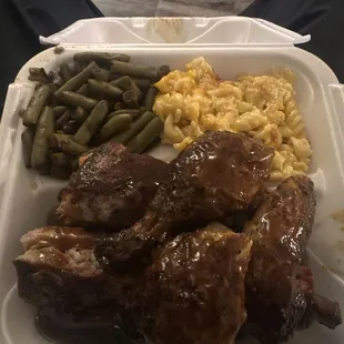 Ribs and chicken with all the sauces! (Yes! The &quot;Hot as hell&quot; too) Mac n cheese, green beans!