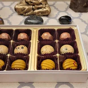 4 Raspberry truffles, 4 Rose water truffles and 4 Vietnamese coffee truffles.